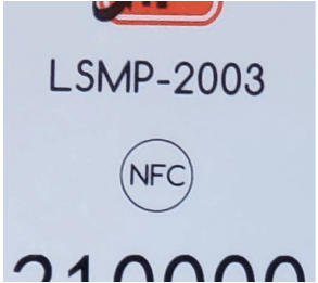image showing the location of NFC antenna on LSMP or CSMP device front cover, indicated by a circle with NFC letter inside on the label